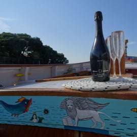 Venezia: Crociera al tramonto con una tipica barca veneziana